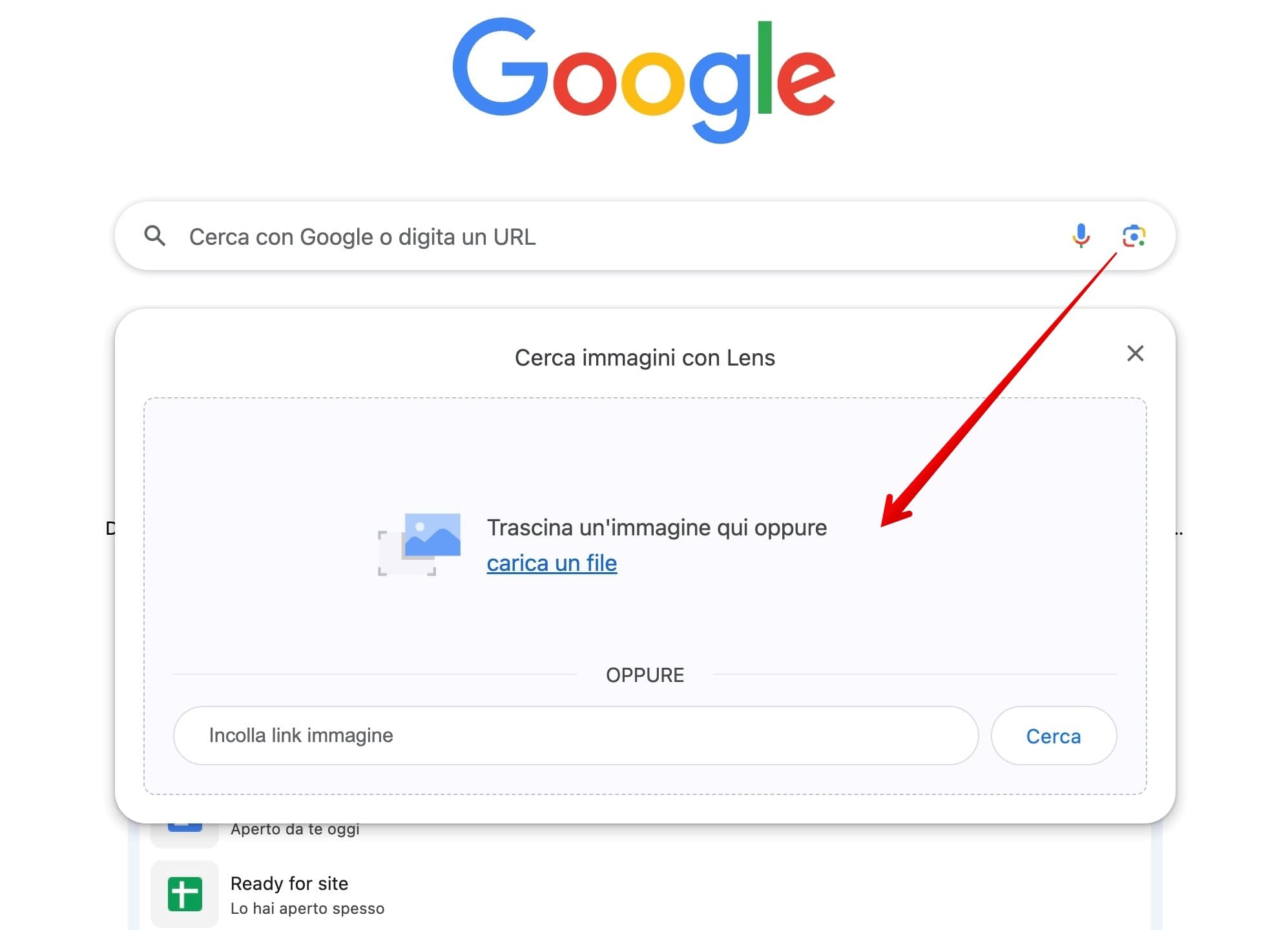 Fai clic sull'icona della fotocamera accanto al campo di ricerca e carica una foto.